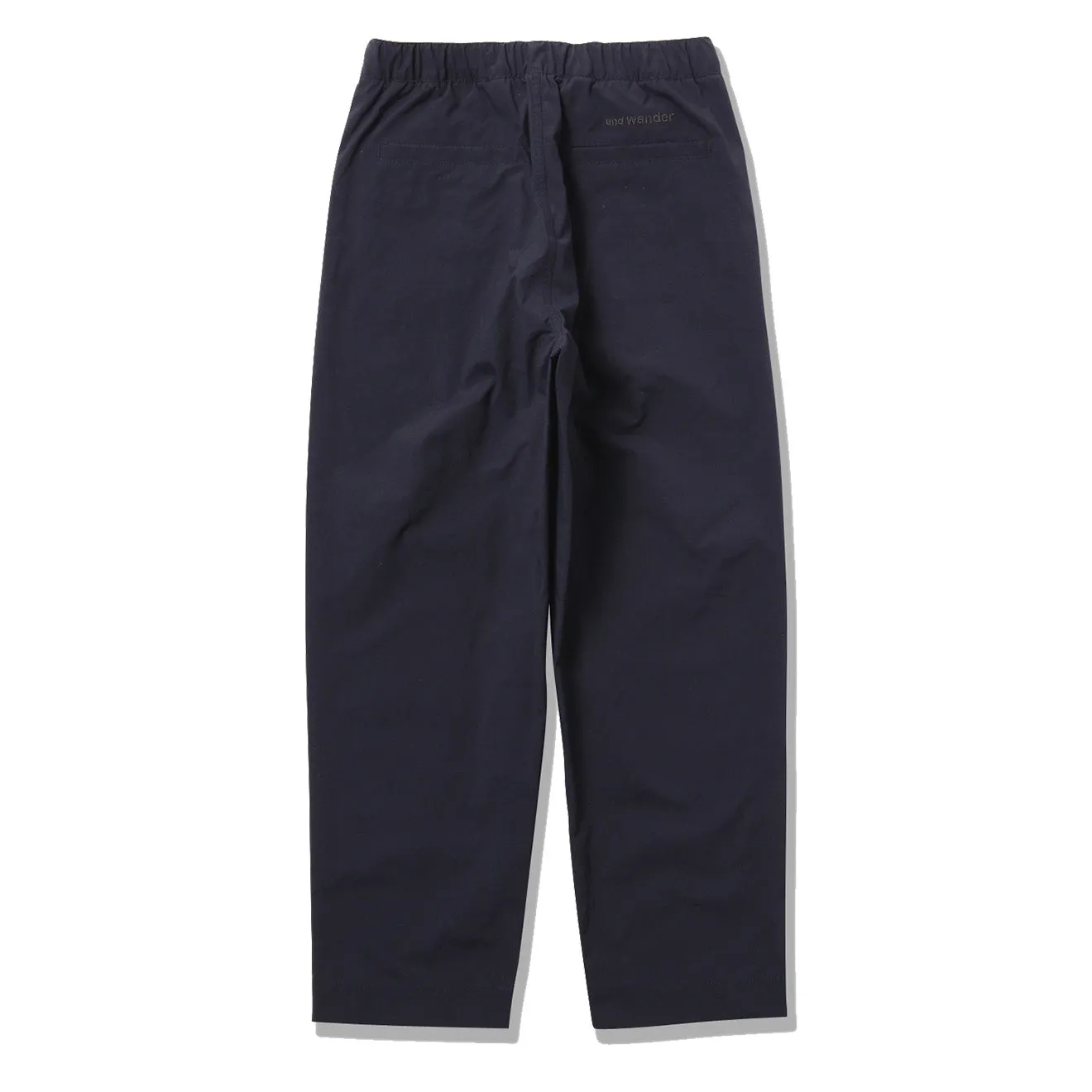 Navy Tapered Chino Pants with Tuck Detailing by And Wander